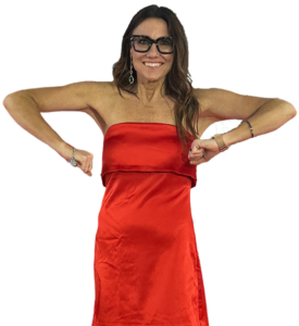 Kim Bode awkwardly standing with her arms out.