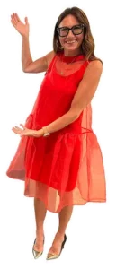 Kim Bode gestures with both hands at something to the left.