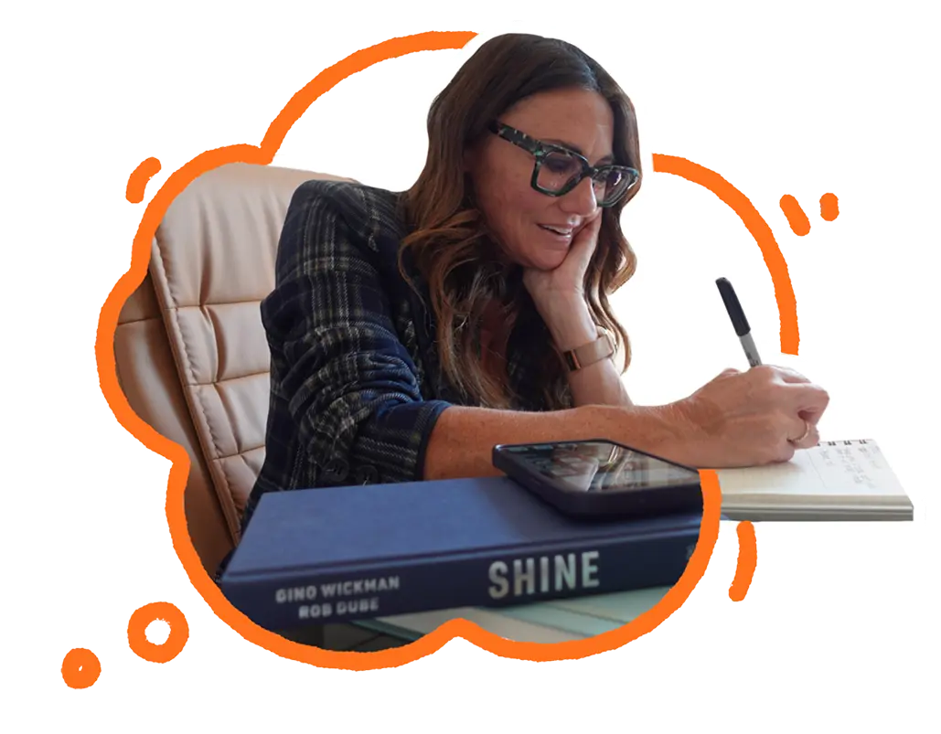 Kim Bode writes something down in her notebook.