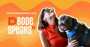 Kim Bode poses with her rescue dog, Frank, next to the words, "Bode Speaks."