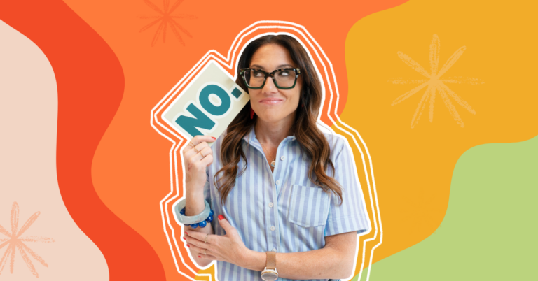 Kim Bode poses holding a postcard that reads, "No."