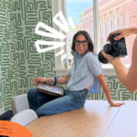 Kim Bode sitting on a table