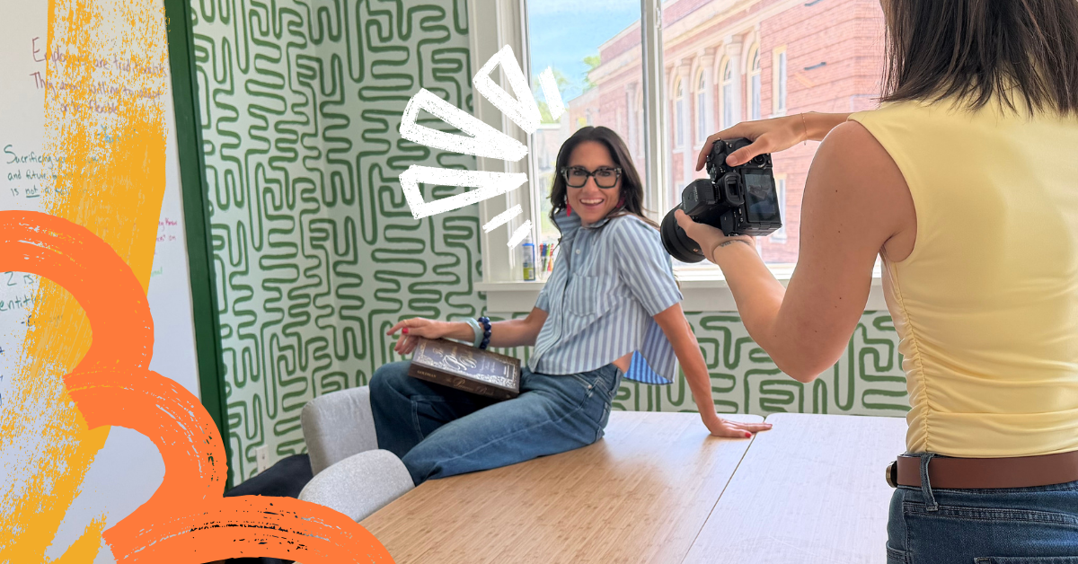 Kim Bode sitting on a table